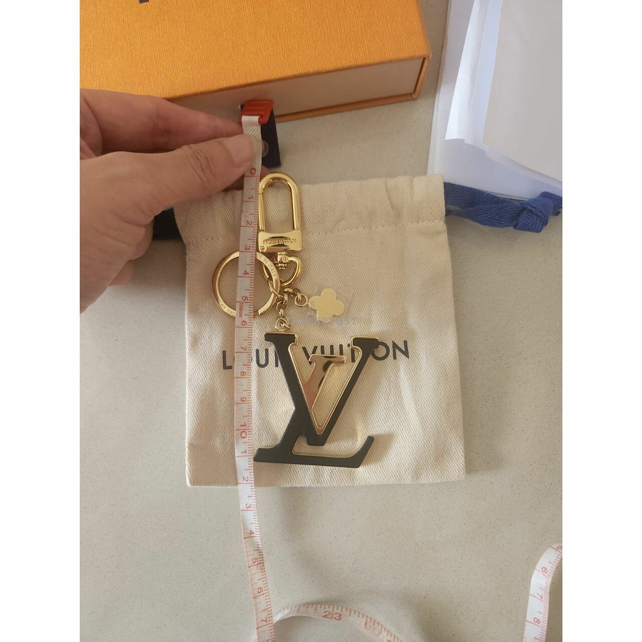 Louis Vuitton Gold Logo Keychain