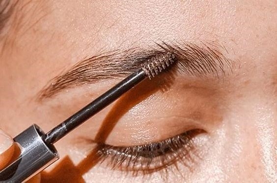 Use your mascara to thicken your eyebrows