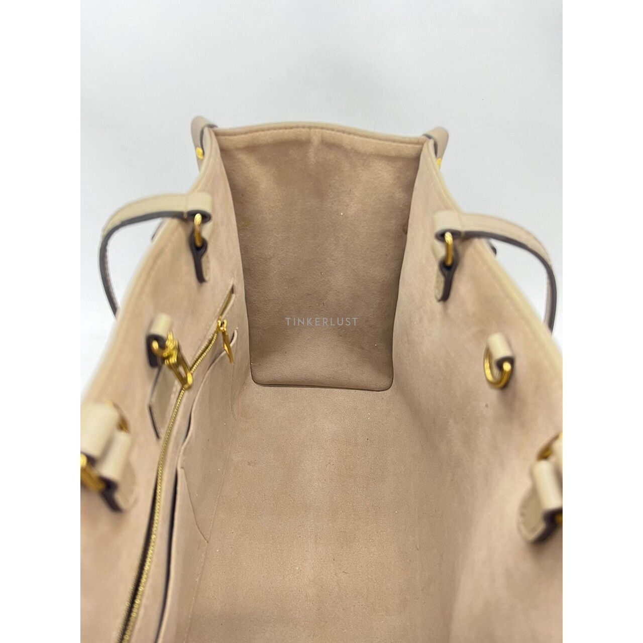 Louis Vuitton On The Go MM Tourtelle Creme Satchel Bag