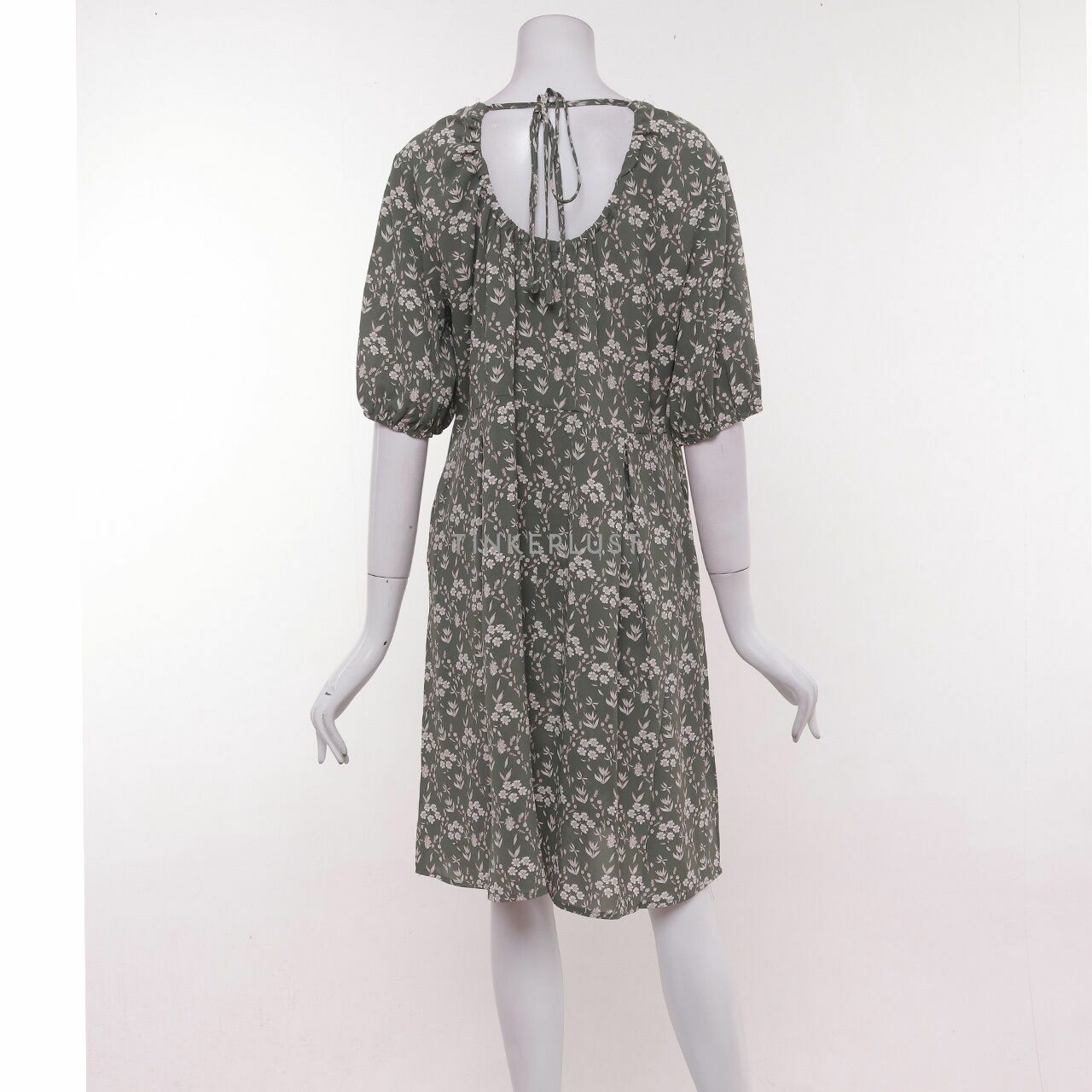 This is April Sage Green Floral Mini Dress