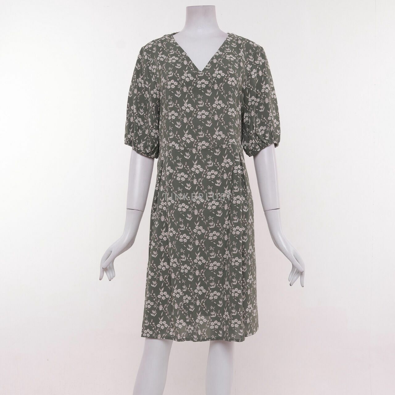 This is April Sage Green Floral Mini Dress