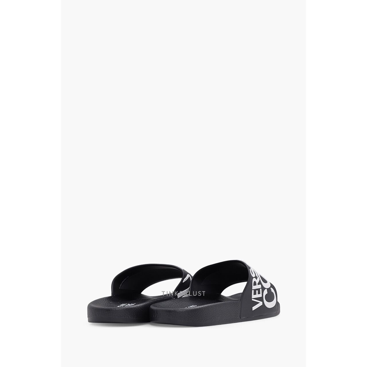 Versace x Jenas Couture Women Diagonal Logo Rubber Slides in Black Sandals