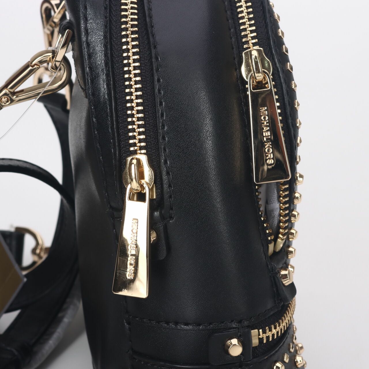 Michael Kors Rhea XS Black Messenger Backpack Stud Gold