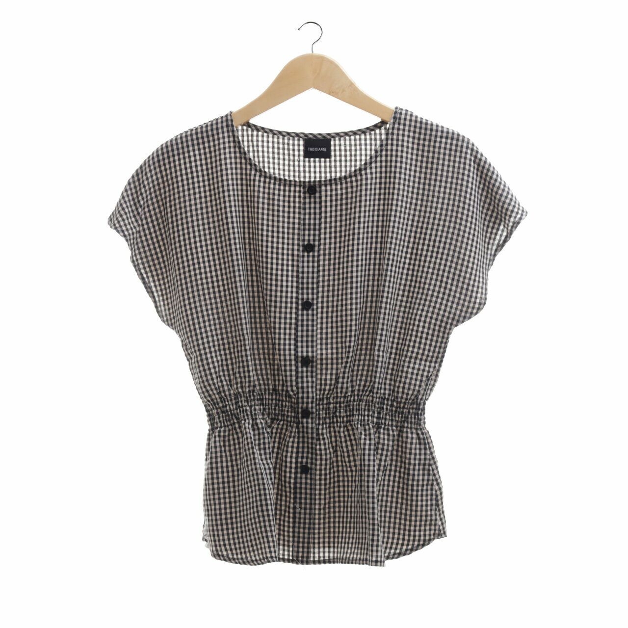 This is April Brown & Black Checkered Blouse