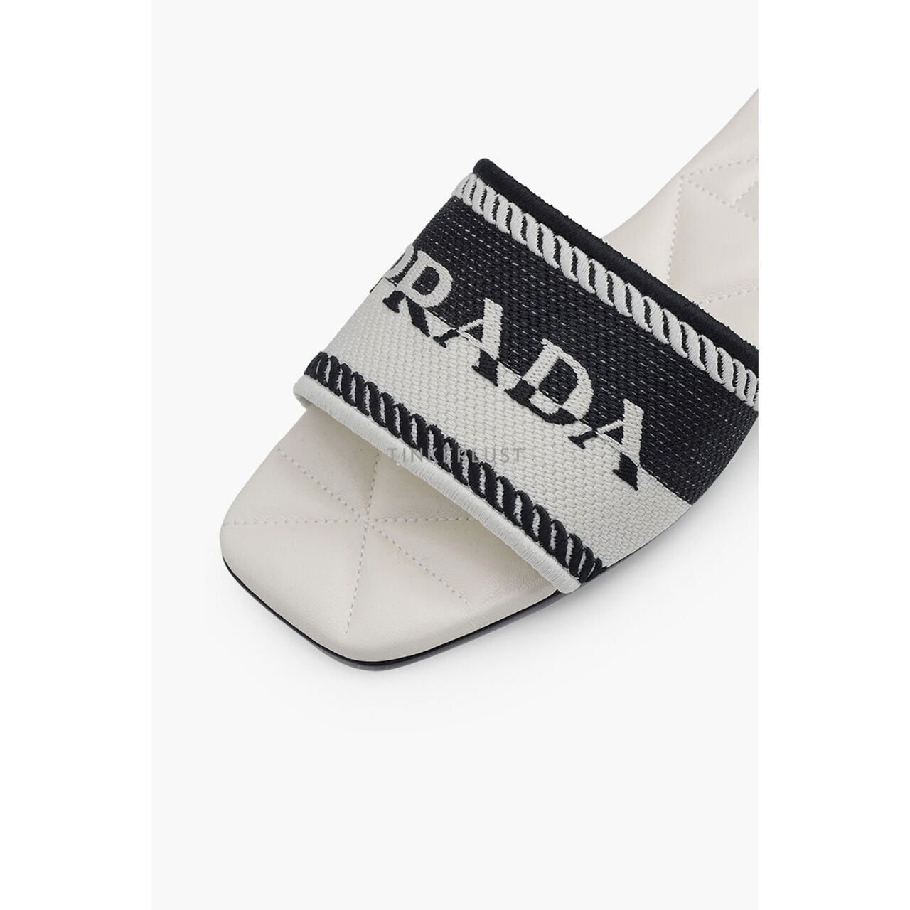 Prada Women Embroidered Lettering Logo Slides in Black/Chalk White with Quilted Sole Sandals