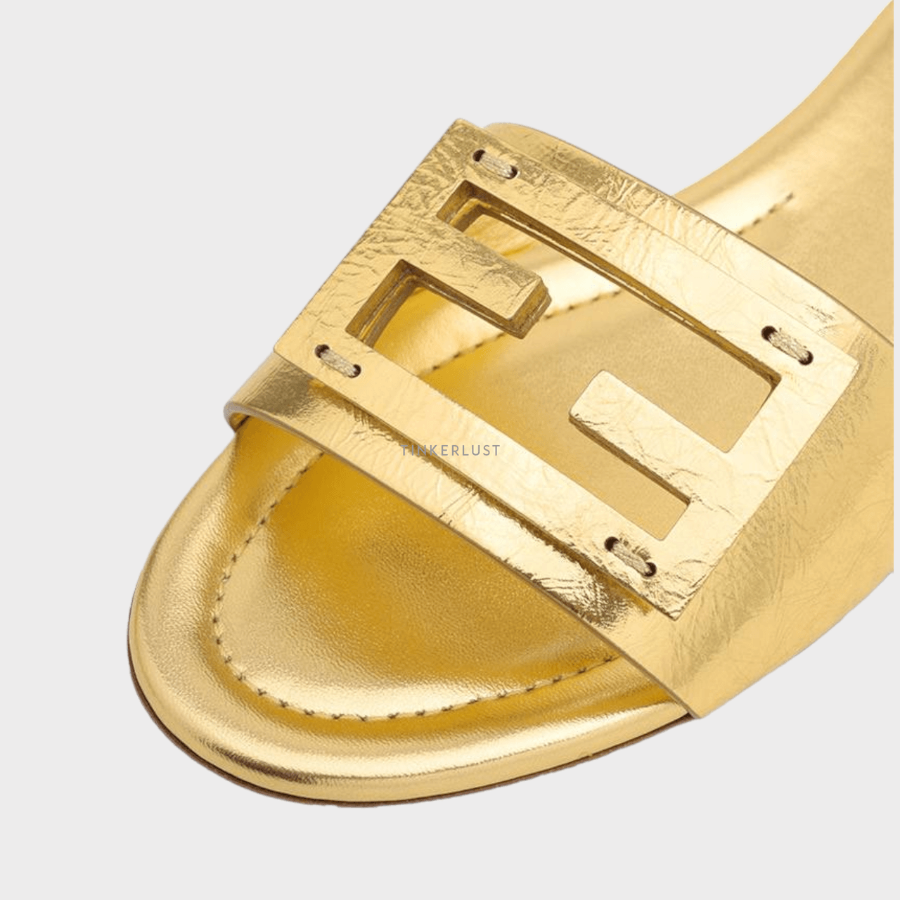 Fendi Women Siganture FF Baguette Slide Sandals in Gold Laminated Nappa Leather