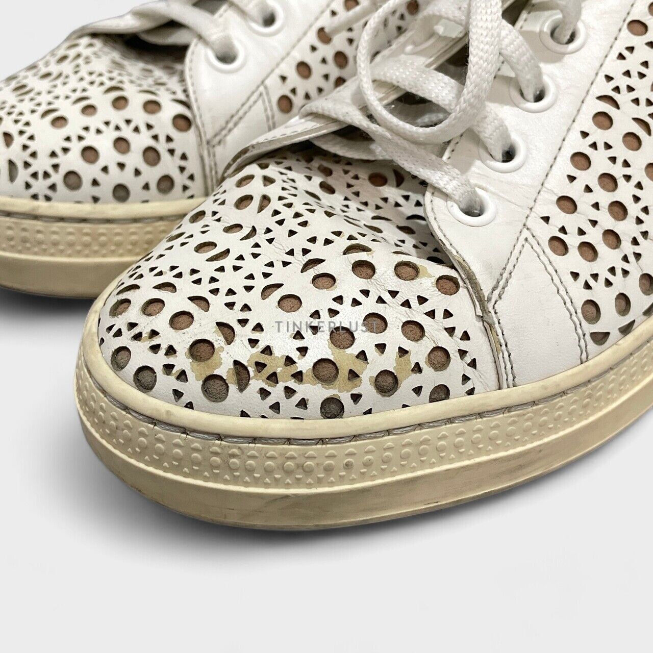 Alaia Laser Cut Leather Lace Up White Sneakers