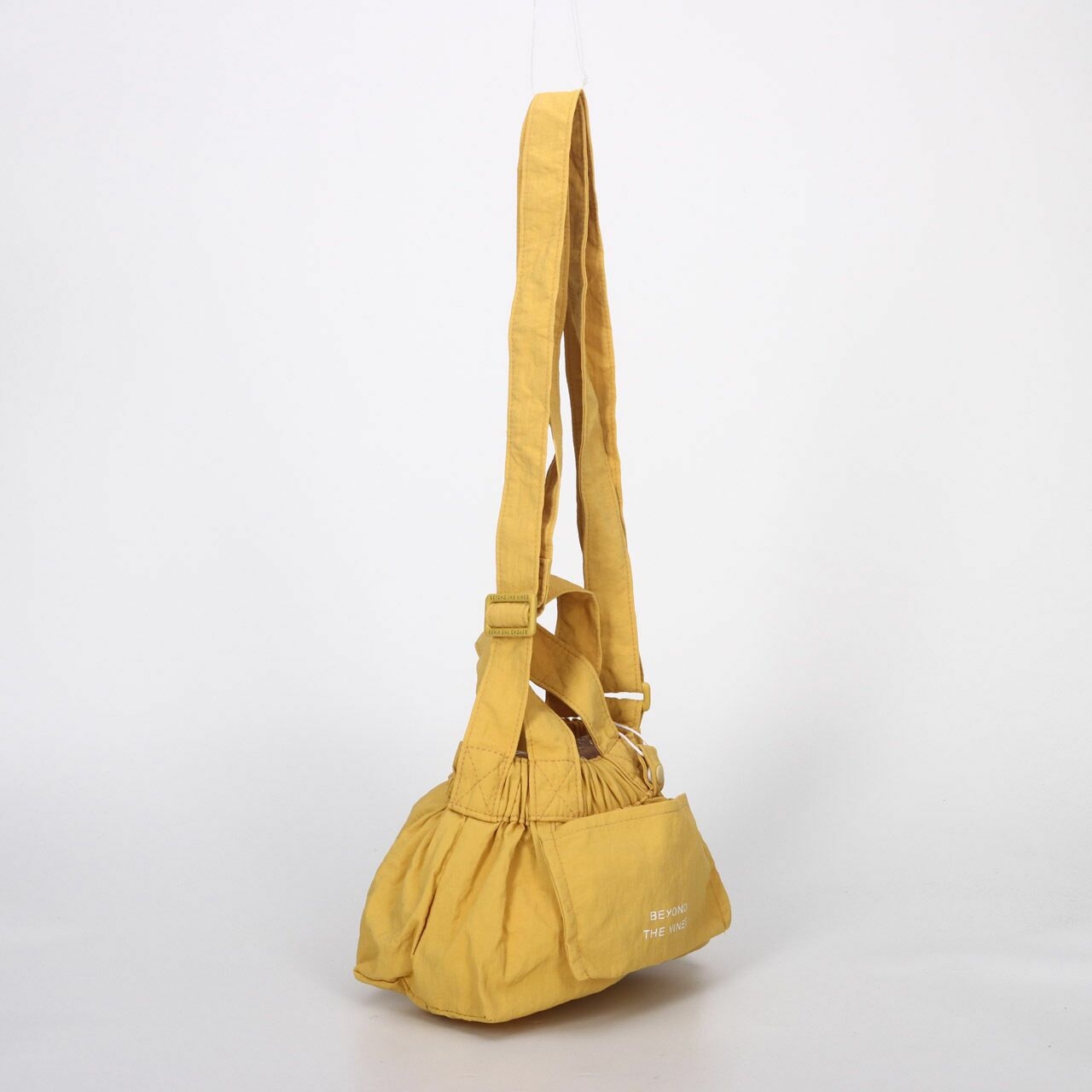 Beyond The vines Mustard Micro Dumpling Sling Bag