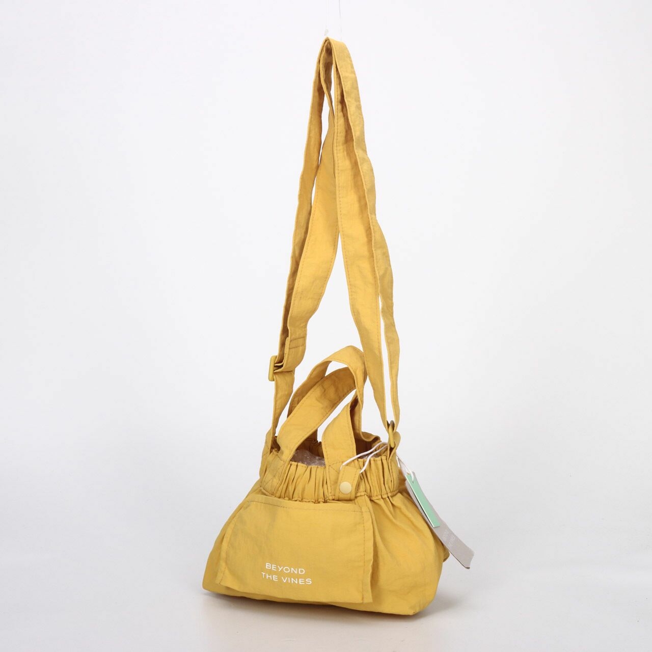 Beyond The vines Mustard Micro Dumpling Sling Bag