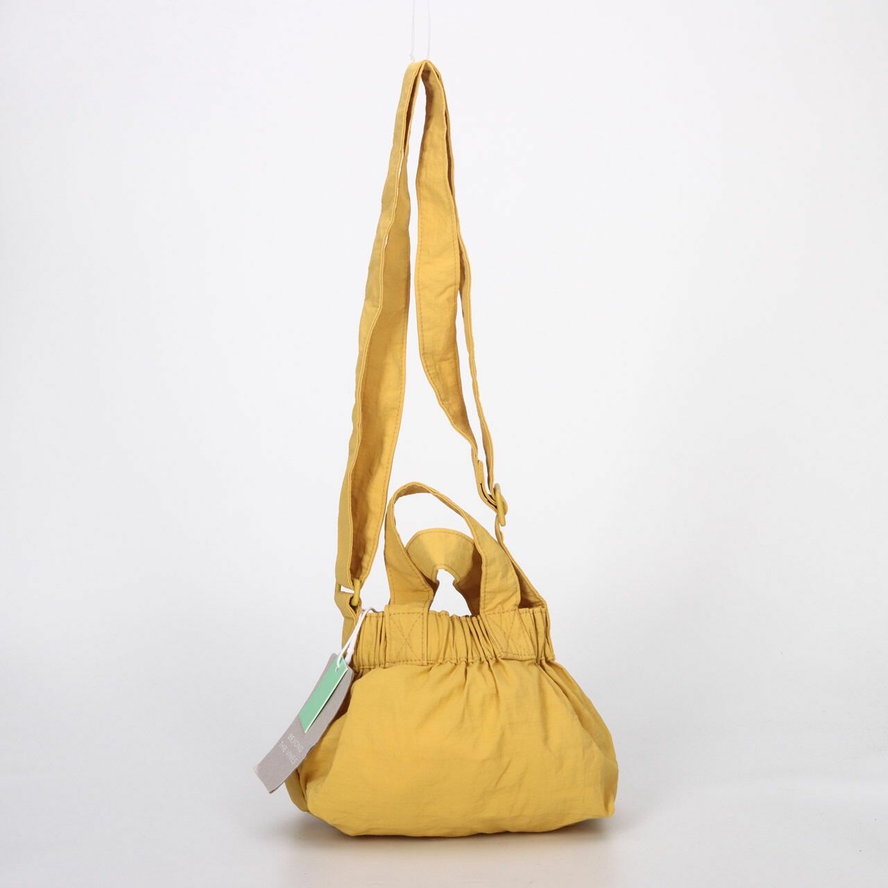 Beyond The vines Mustard Micro Dumpling Sling Bag