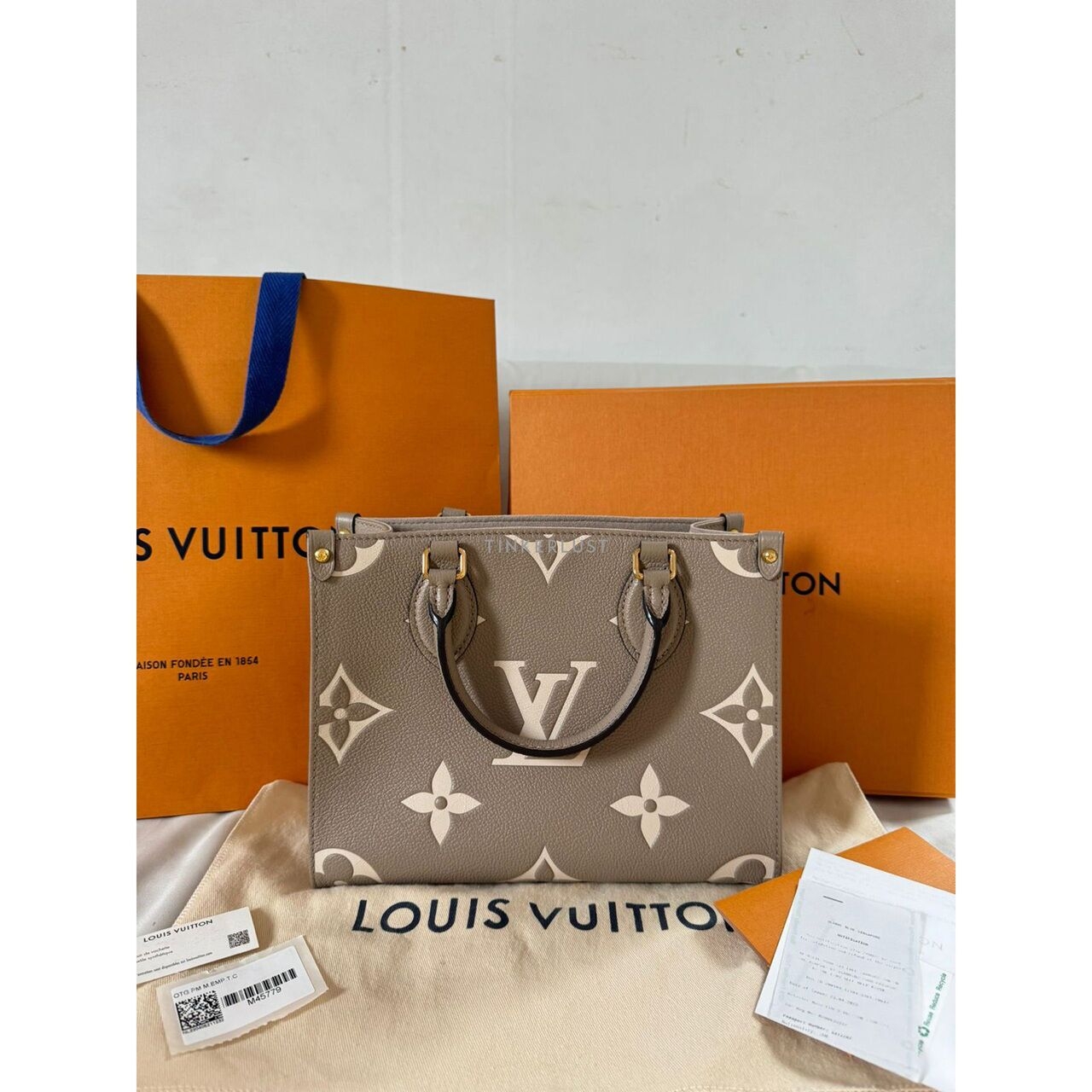 Louis Vuitton On The Go PM 2022 Empreinte Bicolor Gris Tourterelle Satchel Bag