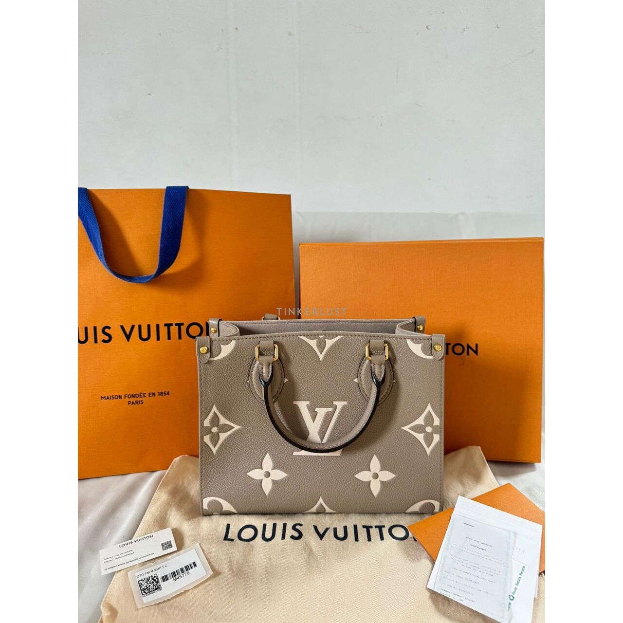 Louis Vuitton On The Go PM 2022 Empreinte Bicolor Gris Tourterelle Satchel Bag