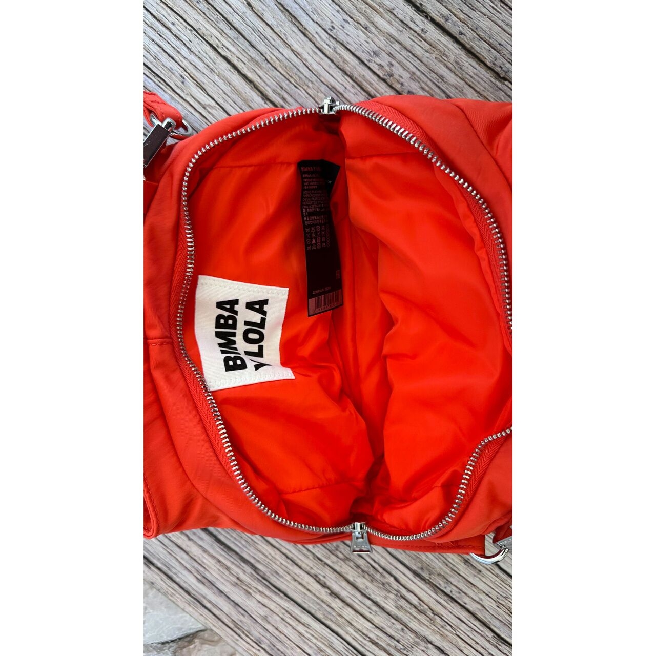 Bimba Y Lola Orange Sling Bag