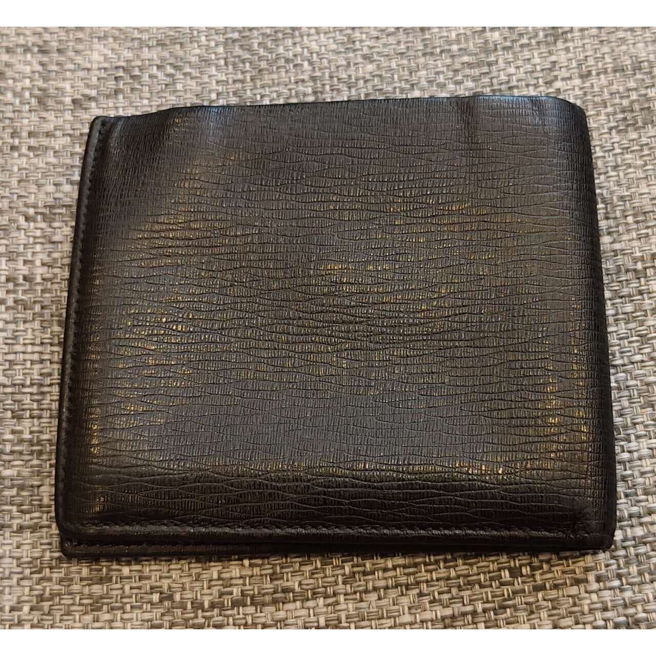 Salvatore Ferragamo Gold & Black Wallet