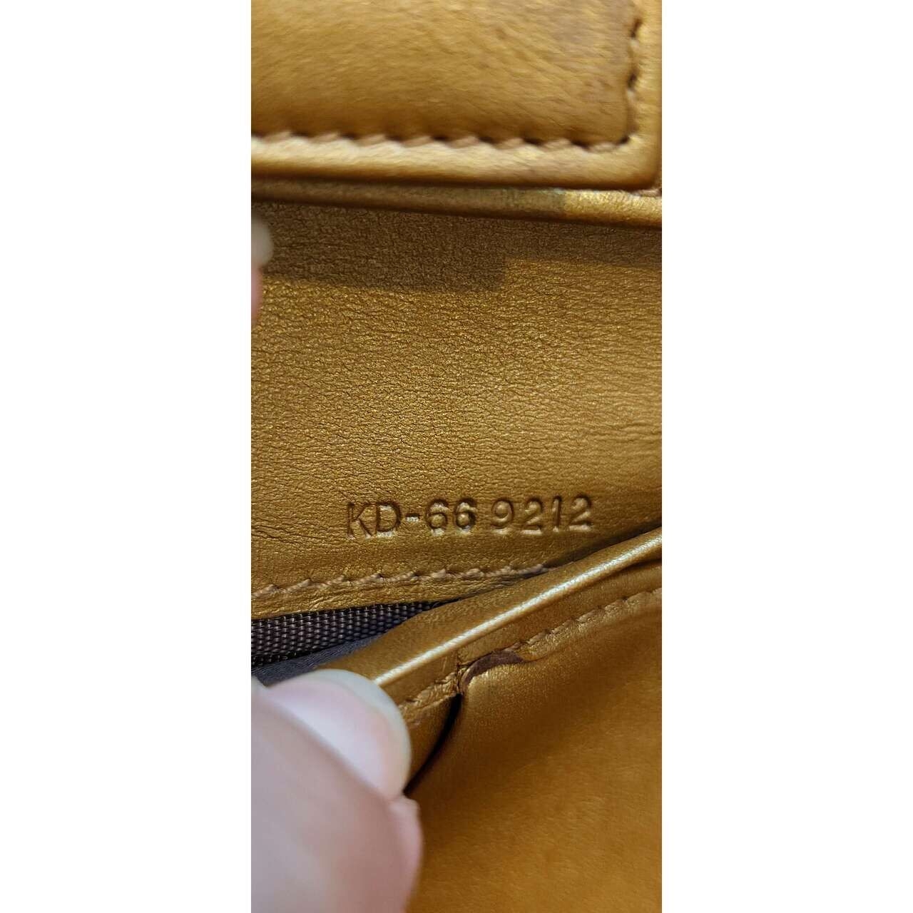 Salvatore Ferragamo Gold & Black Wallet