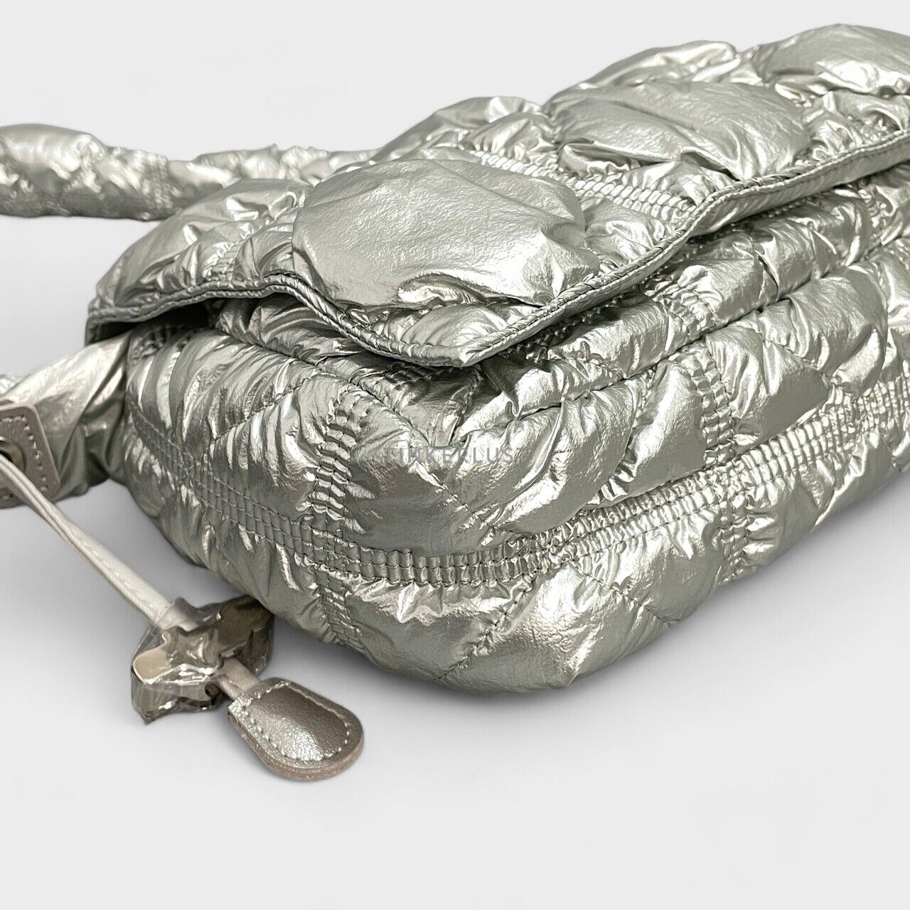 Carlyn Luke Silver Sling Bag