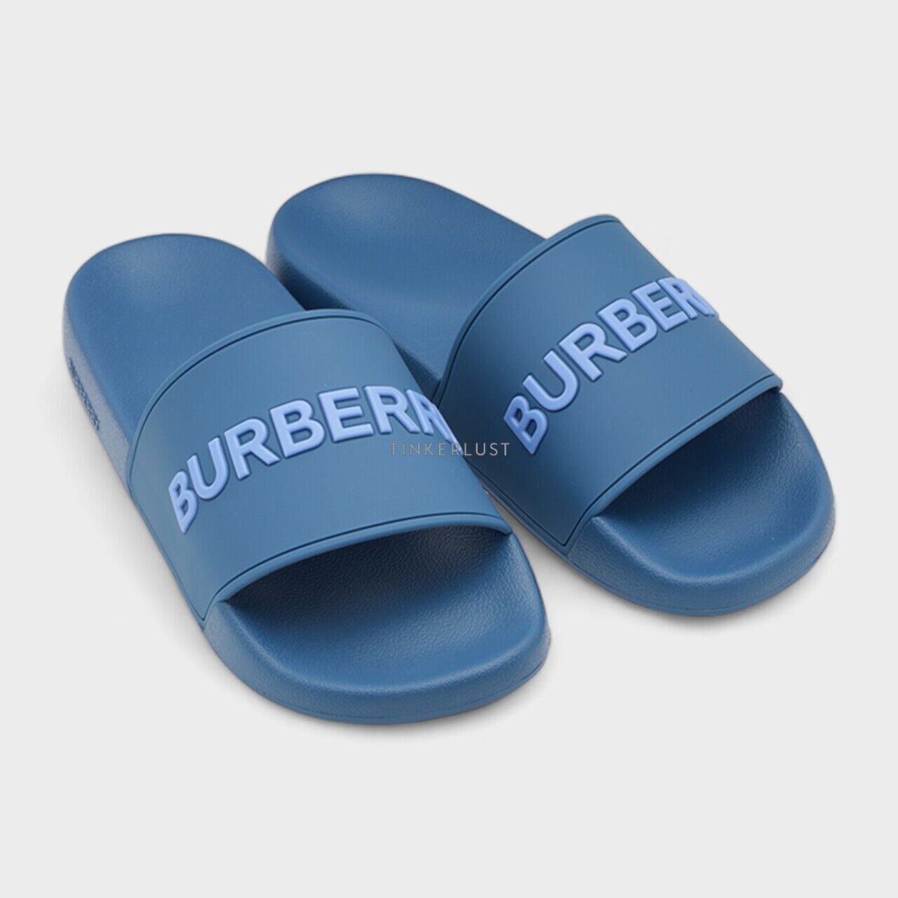 Burberry Men Logo Embossed Slides in Dark Cerulean Blue Sandals