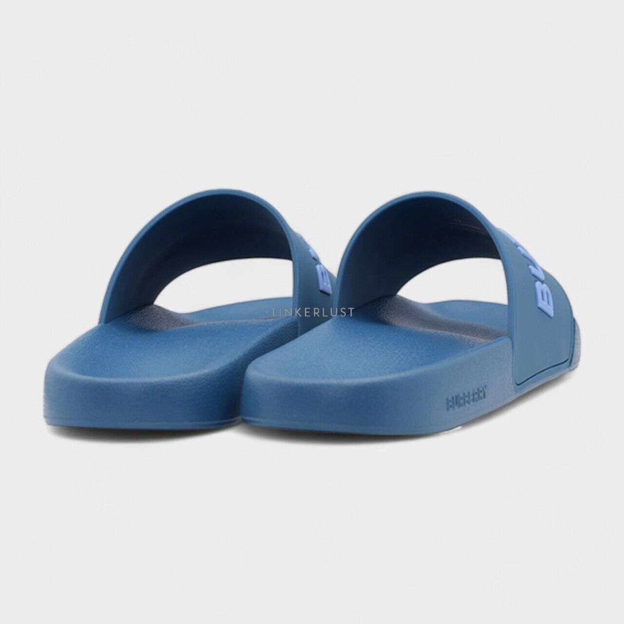 Burberry Men Logo Embossed Slides in Dark Cerulean Blue Sandals