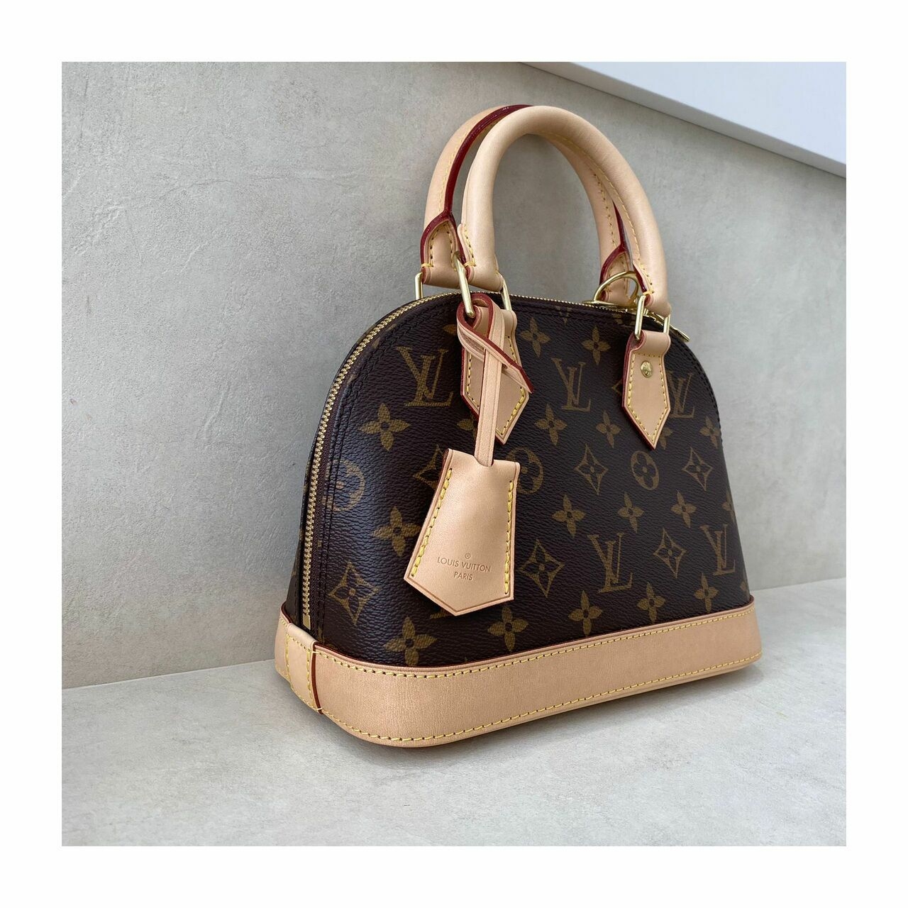 Louis Vuitton Alma BB Monogram Handbag