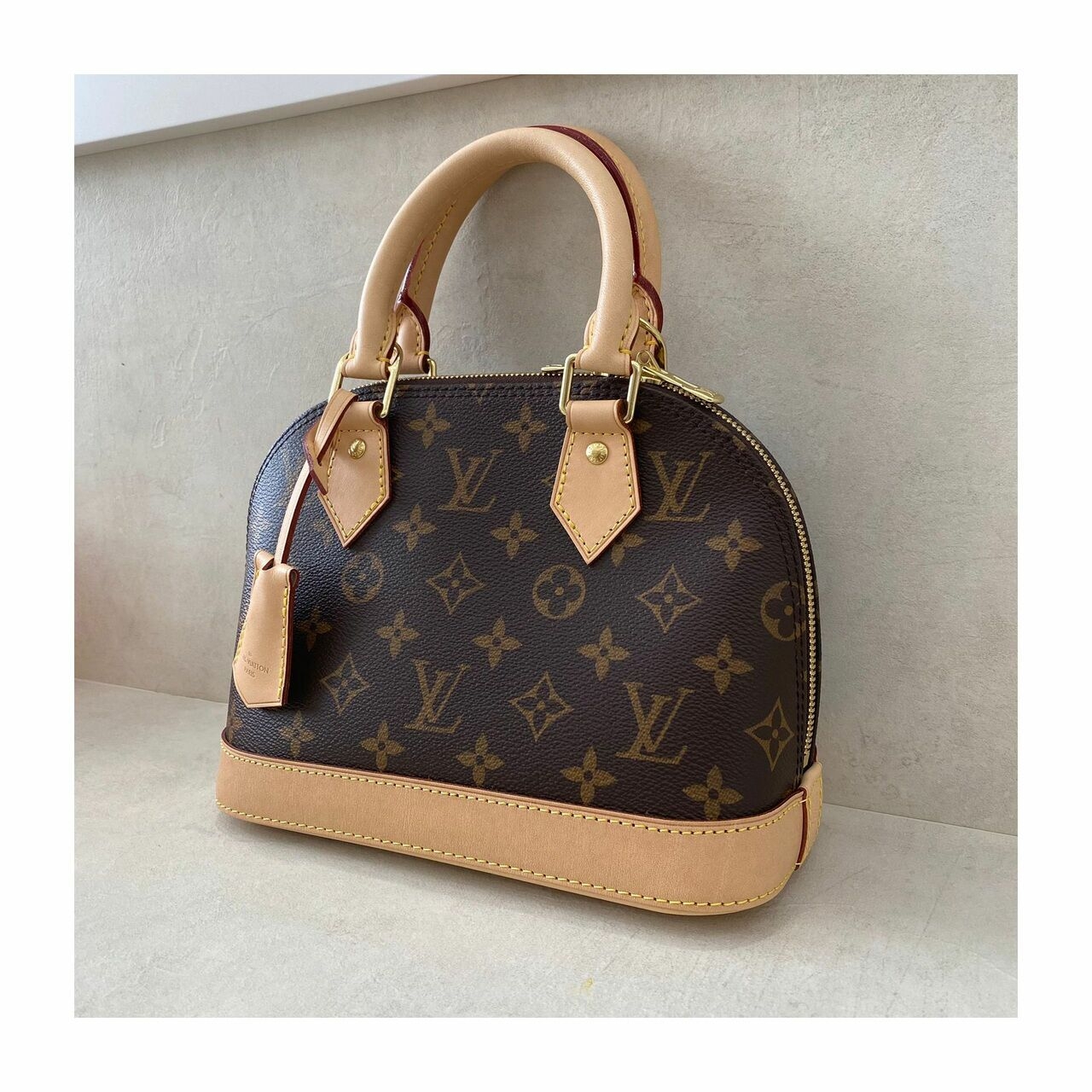 Louis Vuitton Alma BB Monogram Handbag