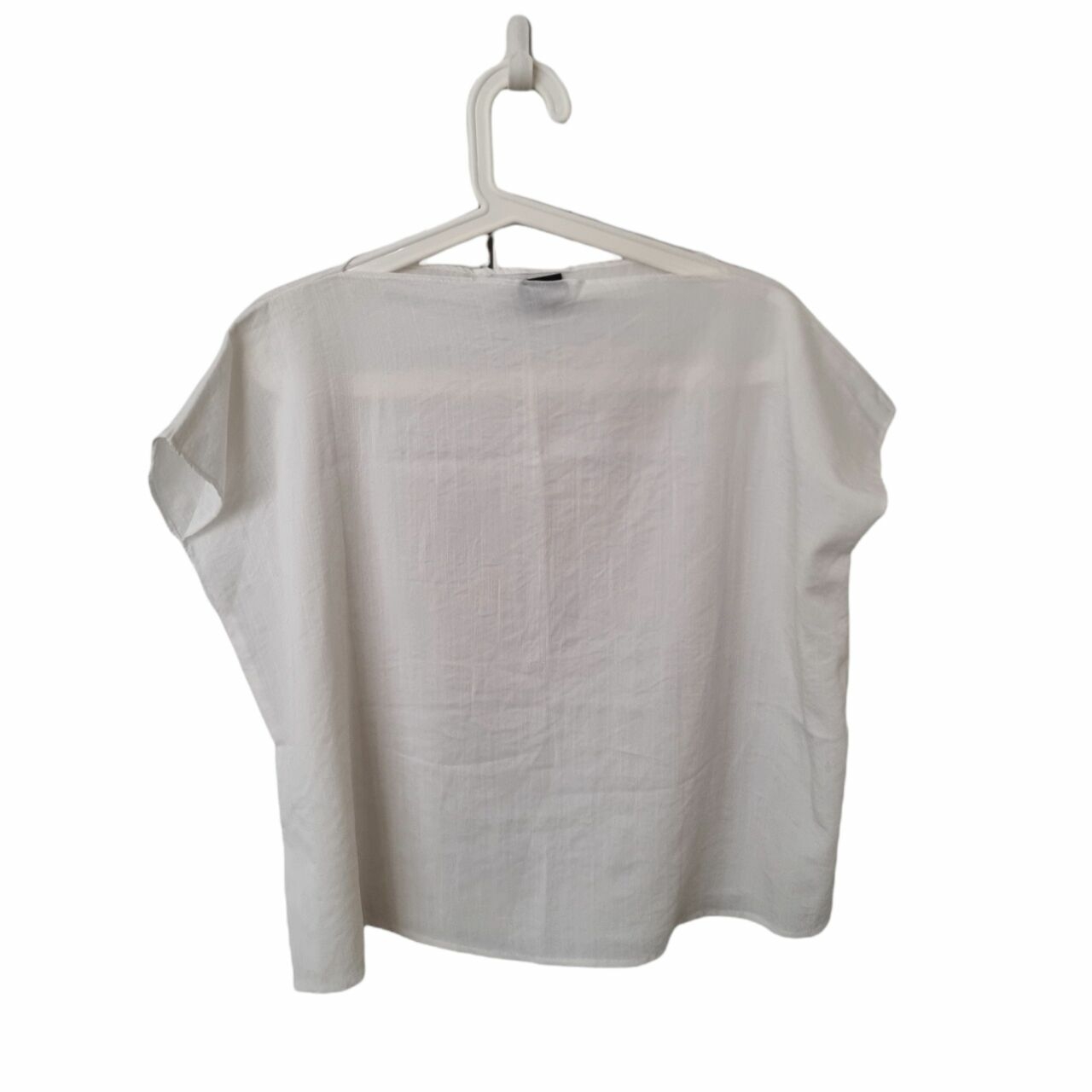 This is April White Boxy Blouse