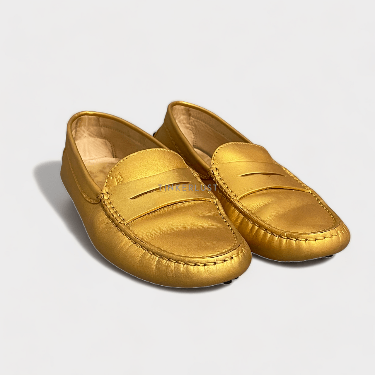 Tod's Gold Loafers