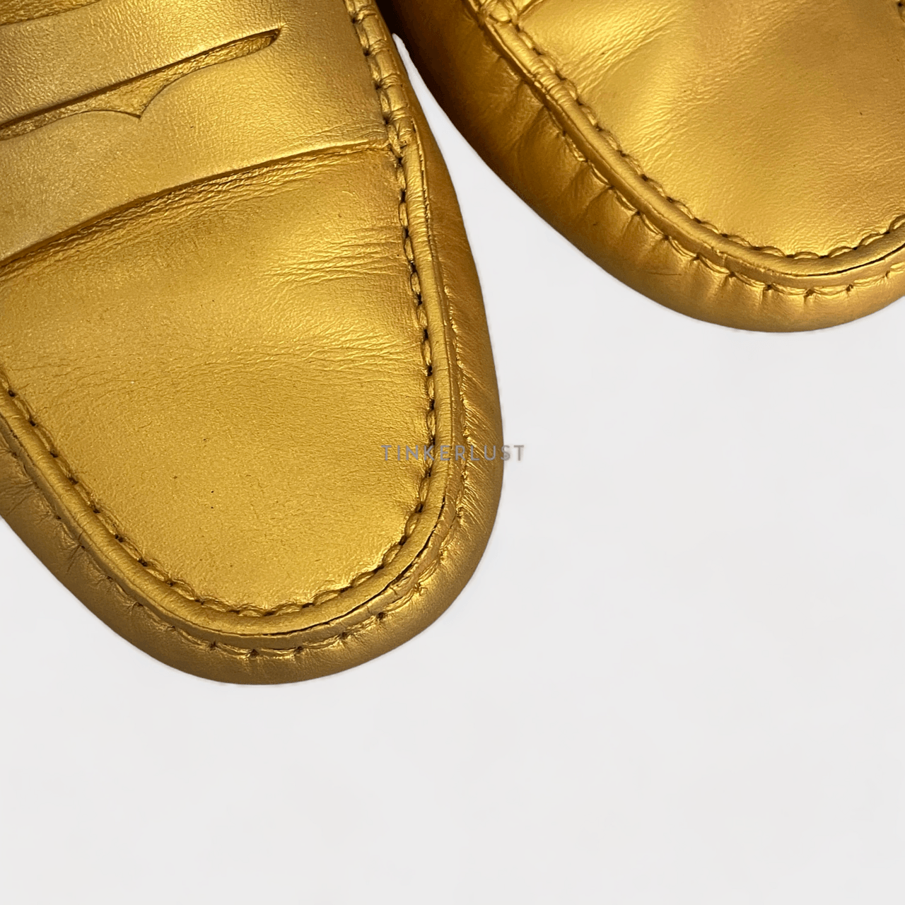 Tod's Gold Loafers